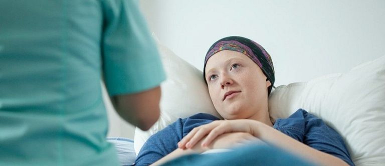 An image of a lady in a hospital depicting PTSD in cancer patients